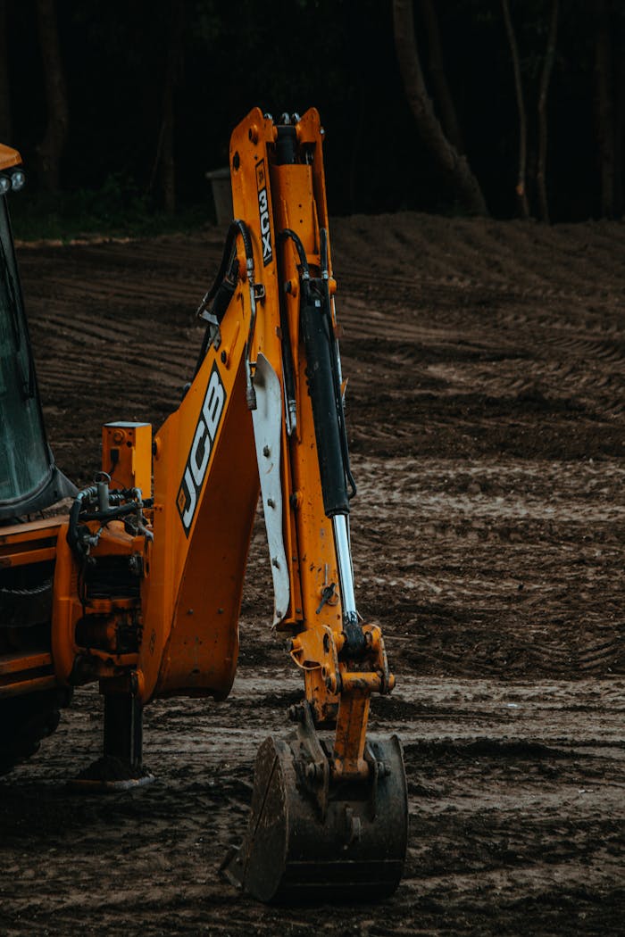 A powerful excavator digging on a construction site, perfect for industrial and construction themes.